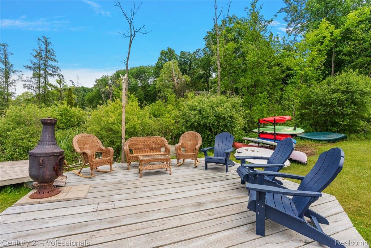 9867 Rainbow Ridge Drive Schoolcraft, MI 49087 - Photo 69 of 82 Expansive outdoor wood deck with a built-in outdoor fireplace