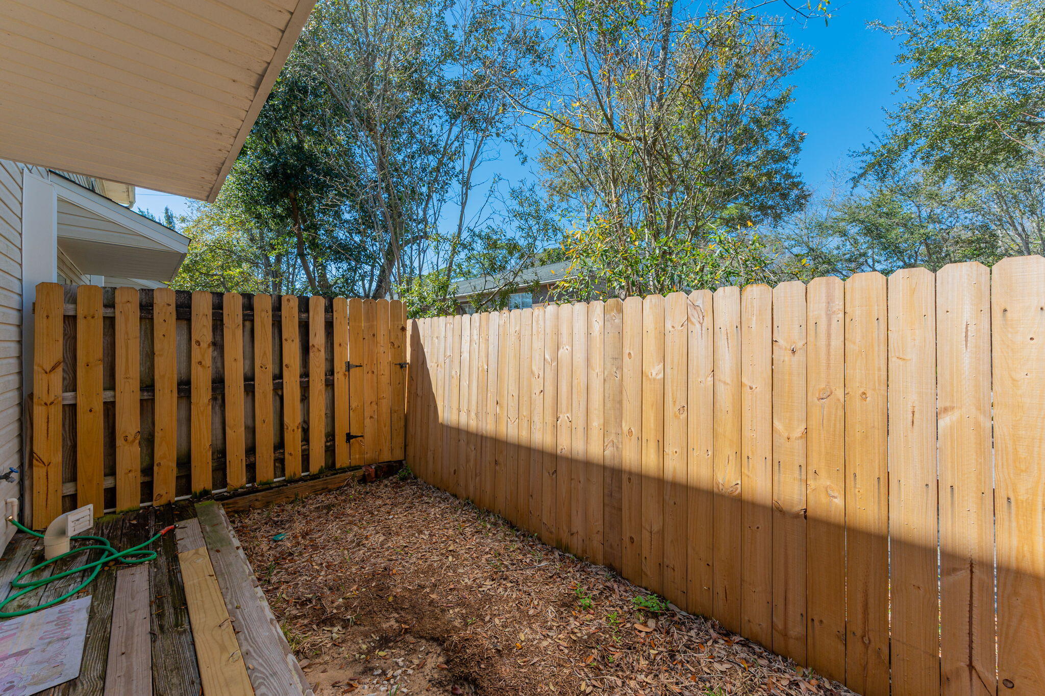 472 Keystone Road Mary Esther, FL 32569 - Photo 12 of 12 a view of a backyard with wooden fence