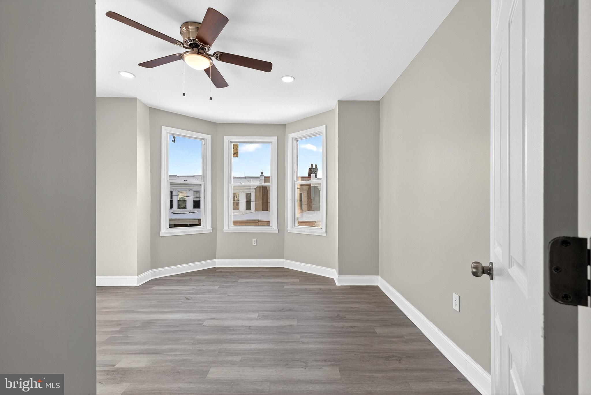 5443 Irving Street Philadelphia, PA 19139 - Photo 23 of 50 wooden floor in an empty room with a window