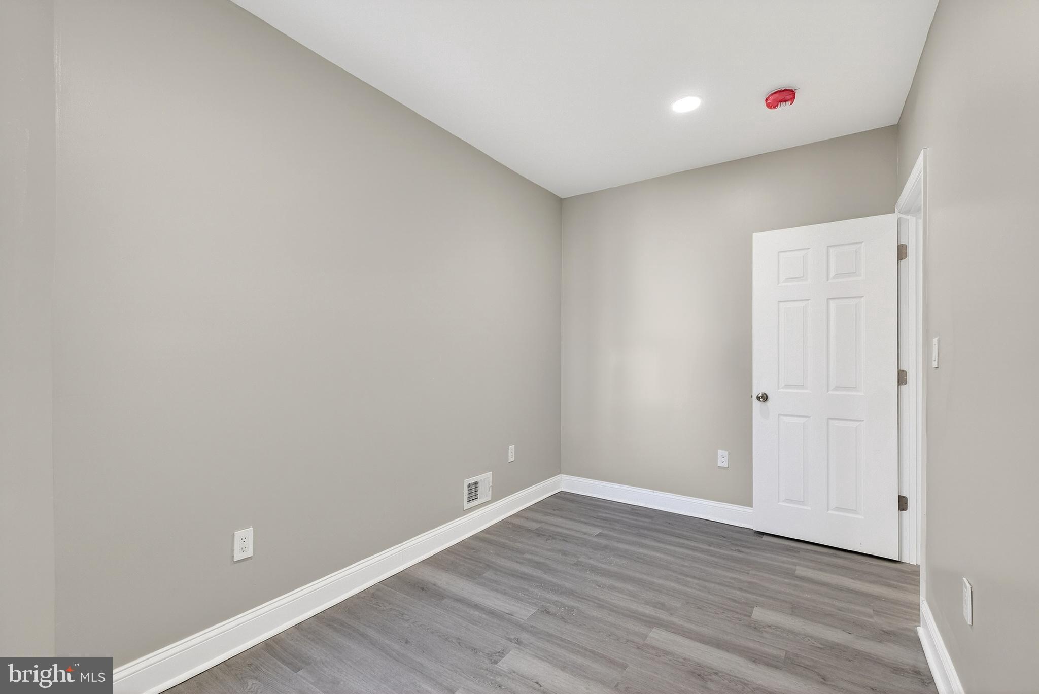 5443 Irving Street Philadelphia, PA 19139 - Photo 30 of 50 wooden floor in an empty room