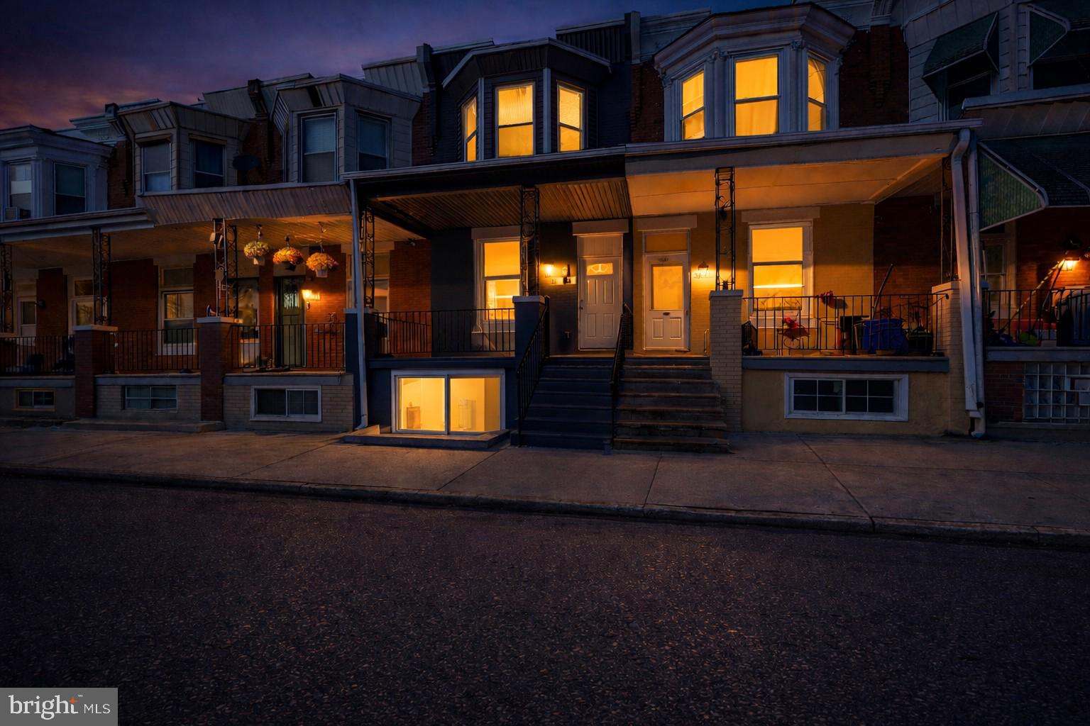 5443 Irving Street Philadelphia, PA 19139 - Photo 3 of 50 a view of building with a yard