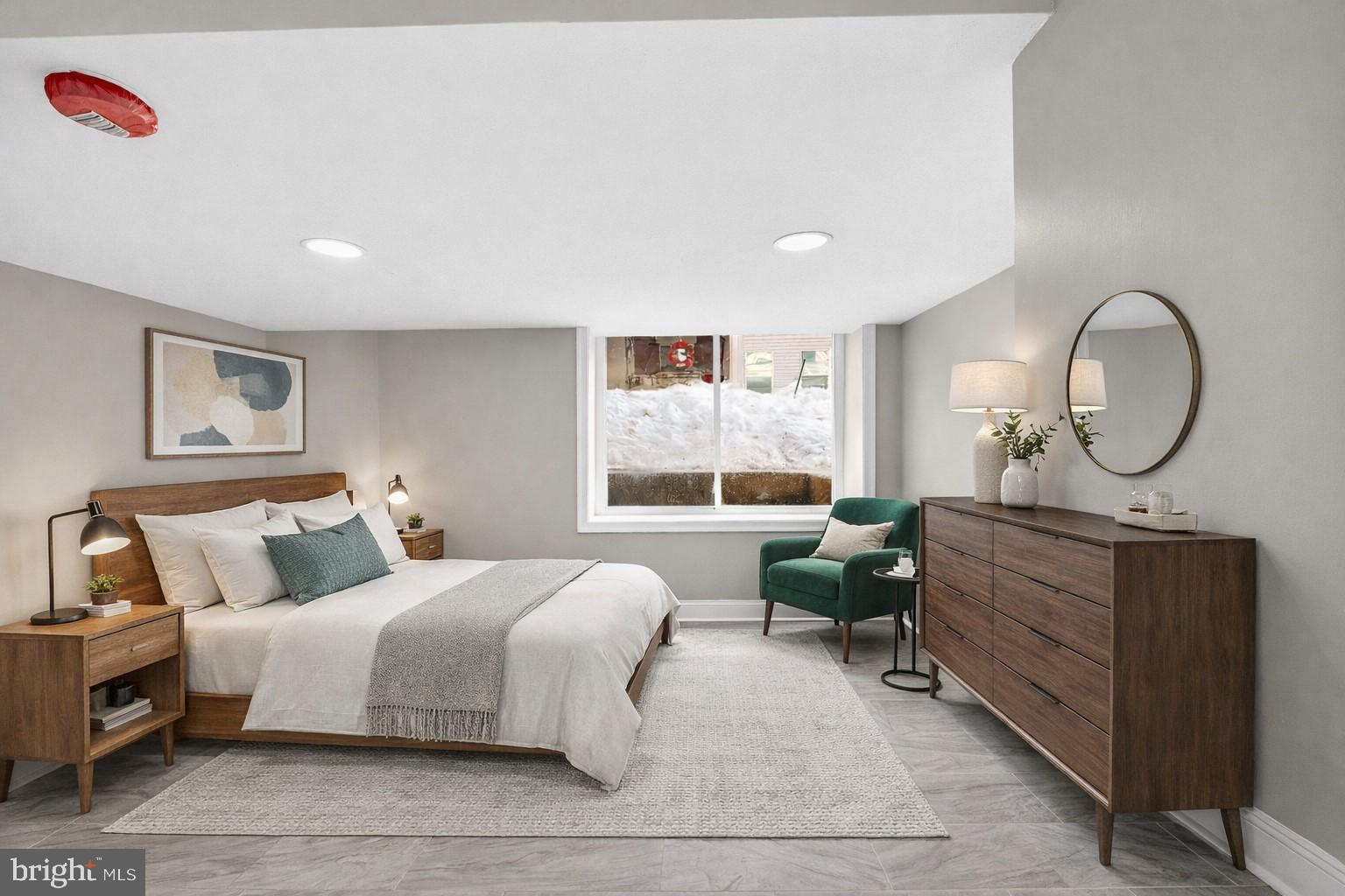 5443 Irving Street Philadelphia, PA 19139 - Photo 35 of 50 a bed room with a bed mirror and a window