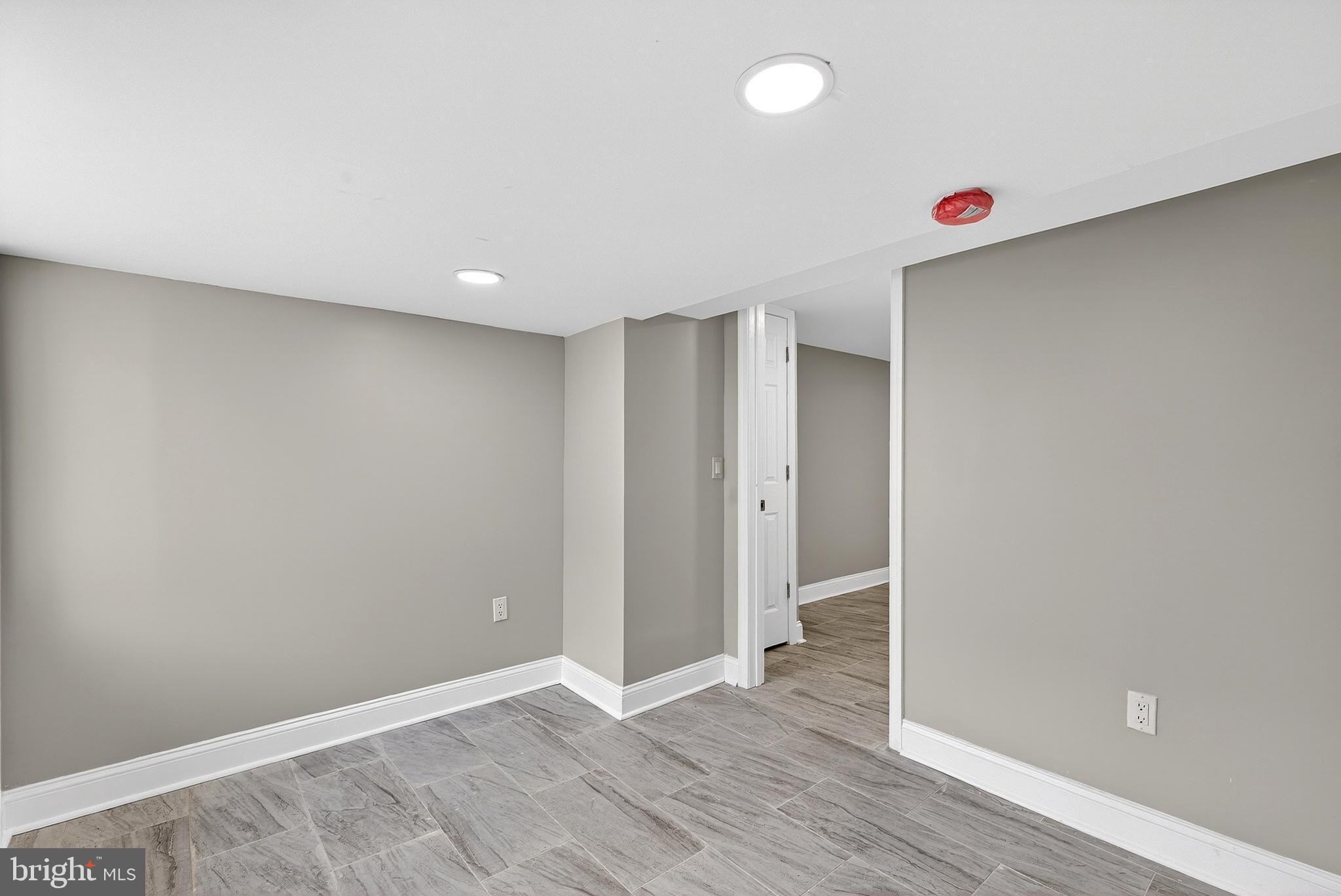 5443 Irving Street Philadelphia, PA 19139 - Photo 37 of 50 an empty room with wooden floor and closet