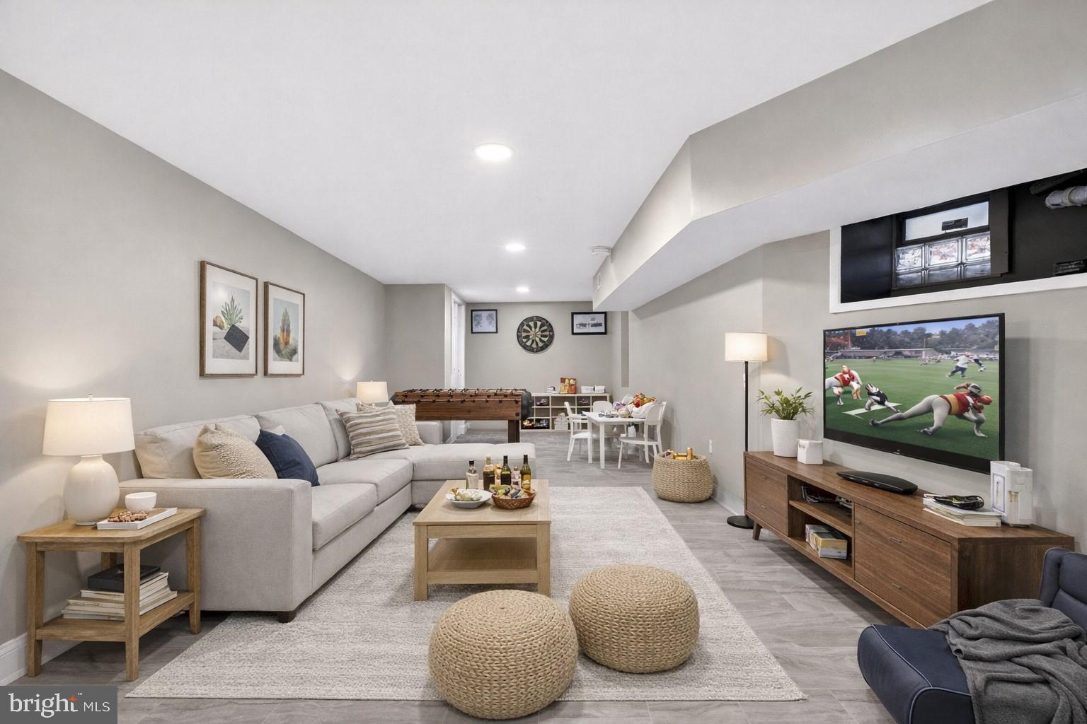 5443 Irving Street Philadelphia, PA 19139 - Photo 40 of 50 a living room with furniture and a flat screen tv
