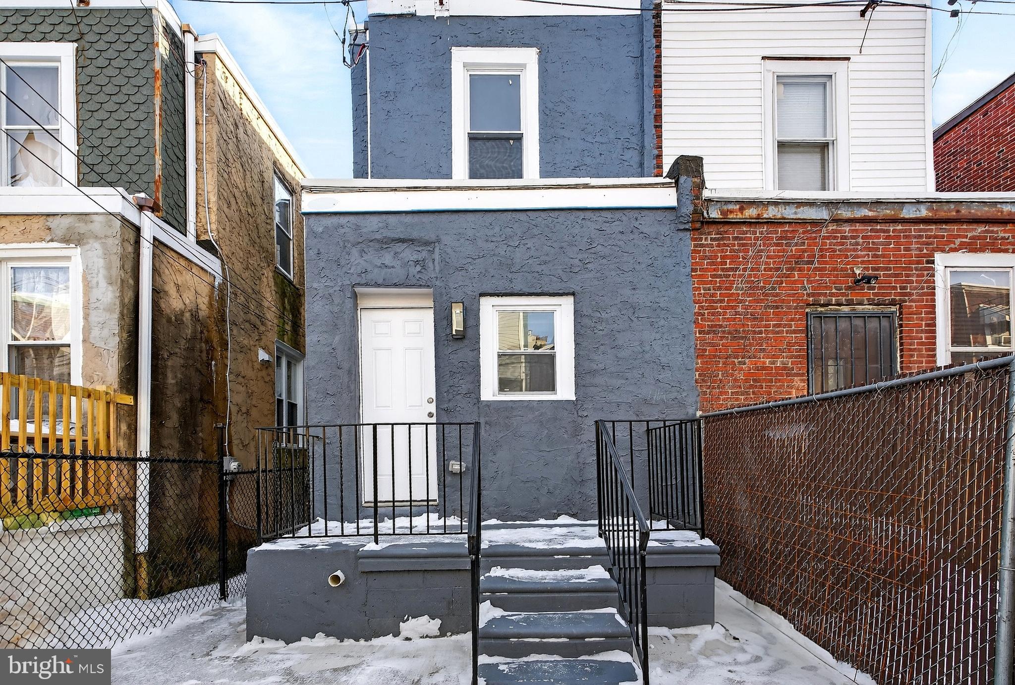 5443 Irving Street Philadelphia, PA 19139 - Photo 47 of 50 a view of a brick building with many windows