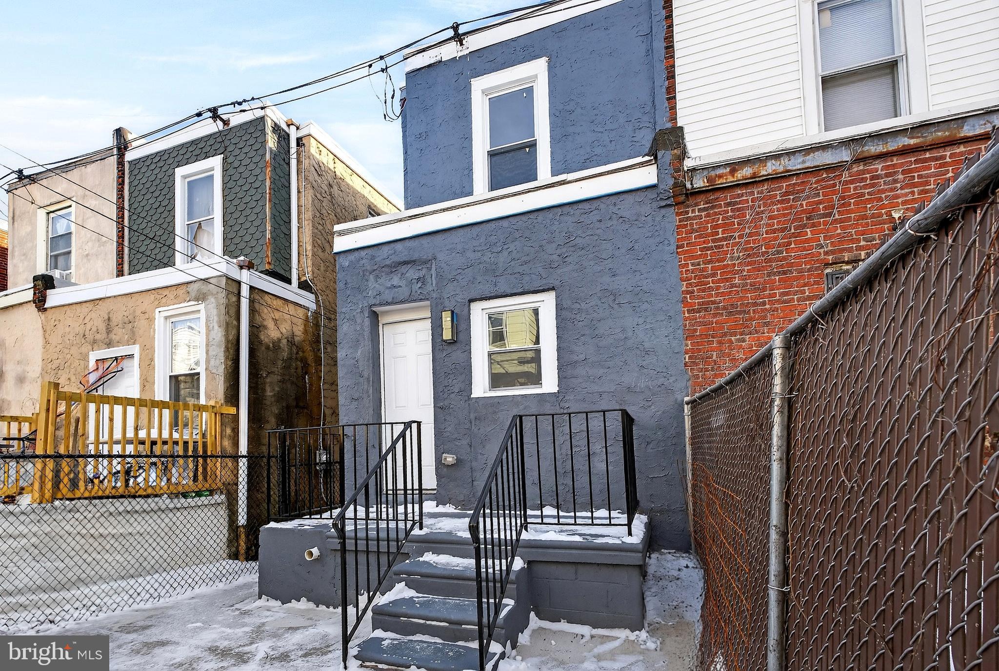 5443 Irving Street Philadelphia, PA 19139 - Photo 48 of 50 a view of a house with wooden fence
