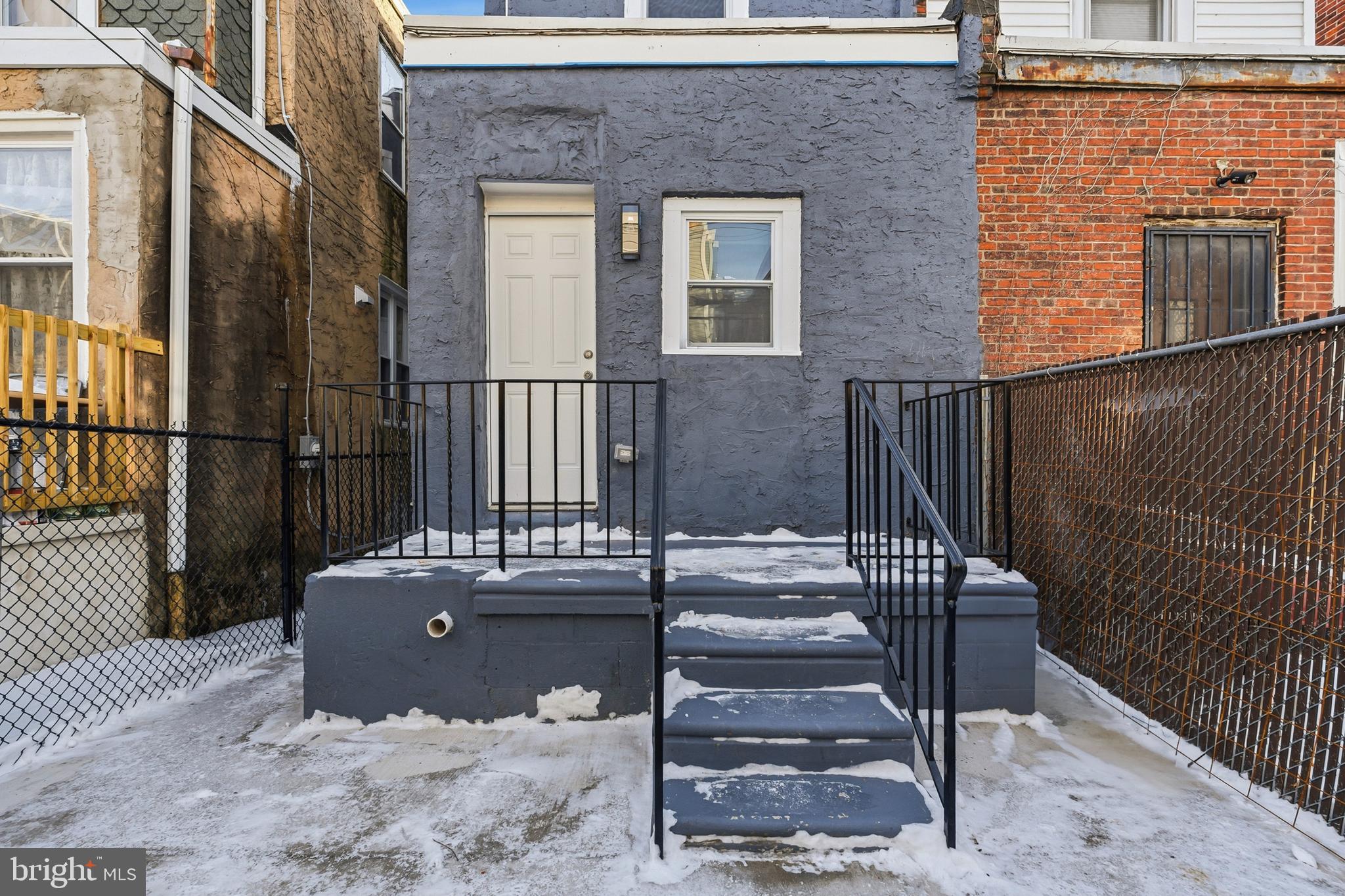 5443 Irving Street Philadelphia, PA 19139 - Photo 49 of 50 a view of house with stairs and outdoor seating