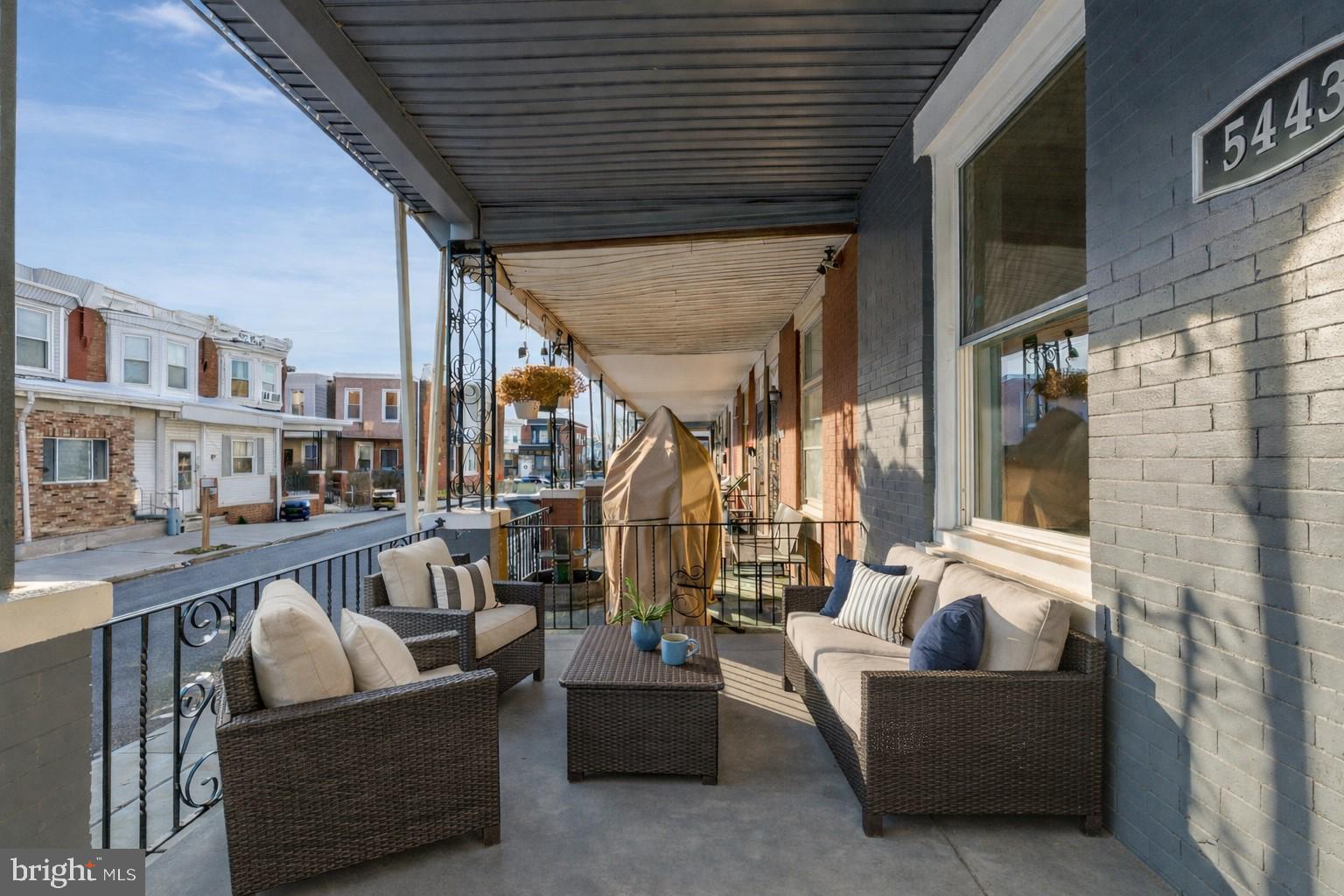 5443 Irving Street Philadelphia, PA 19139 - Photo 5 of 50 a living room with furniture and a large window