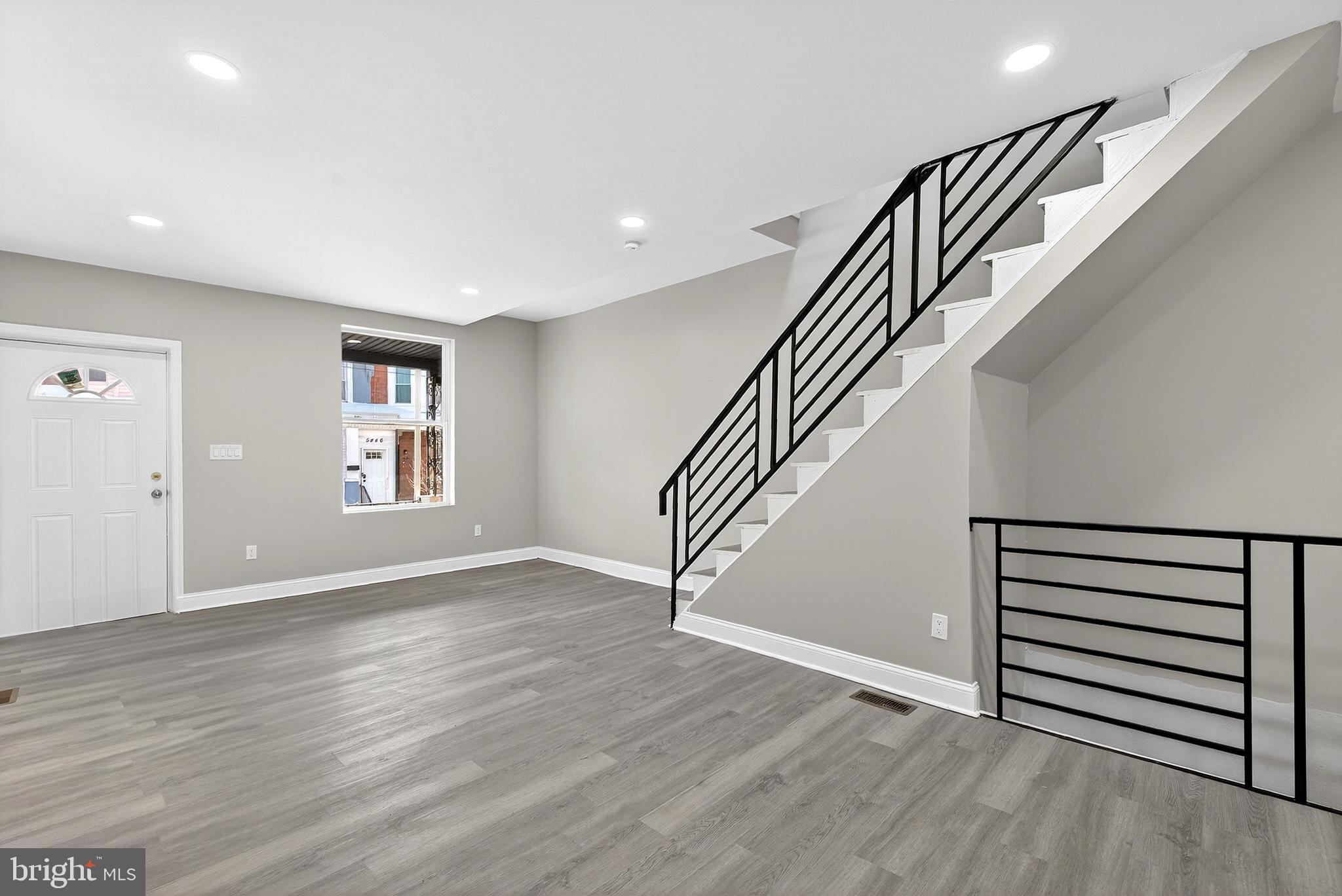 5443 Irving Street Philadelphia, PA 19139 - Photo 9 of 50 a view of entryway and hall with wooden floor