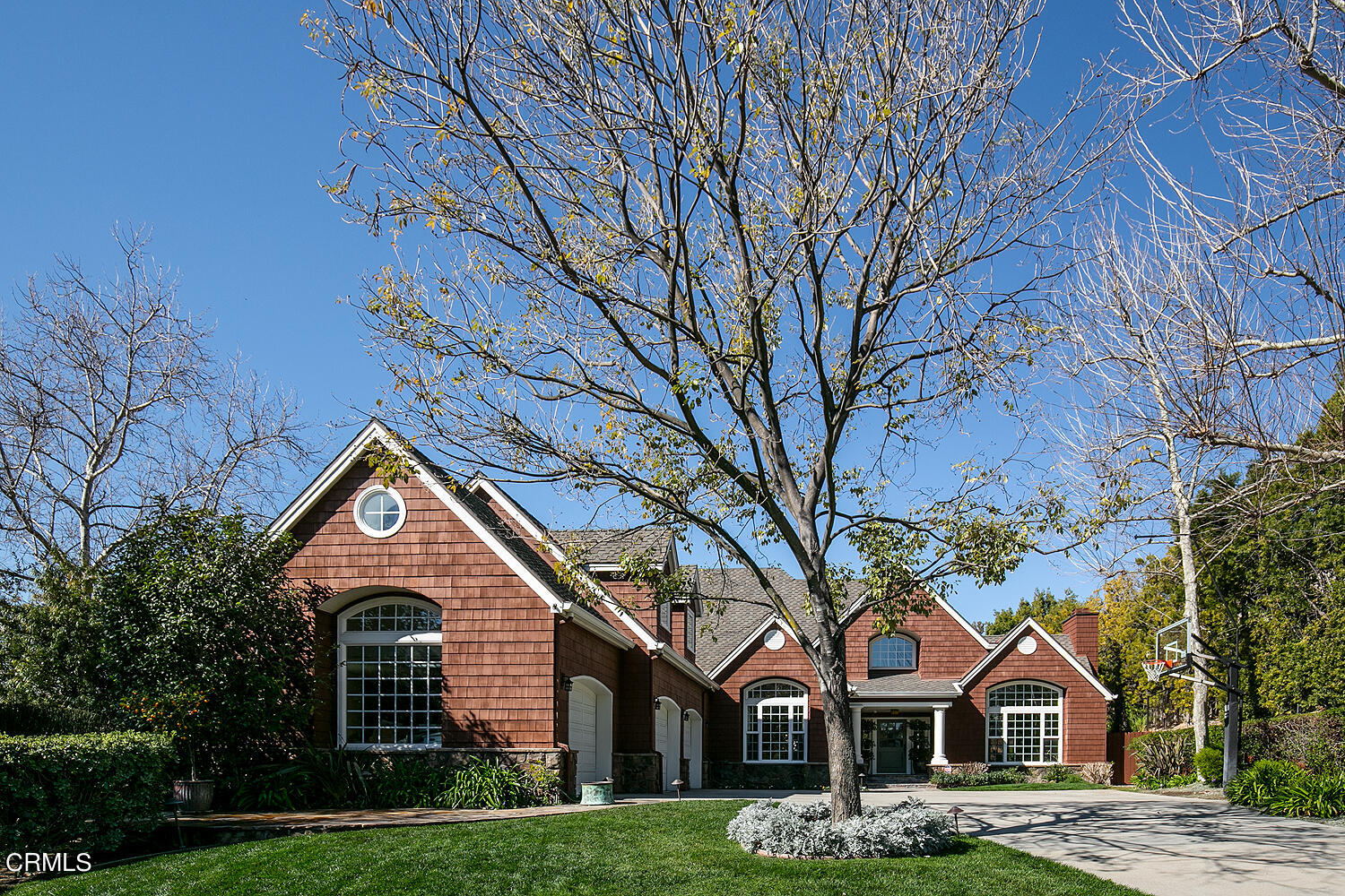 4535 Lone Pine Lane La Canada Flintridge, CA 91011 - Photo 2 of 62 a front view of a house with a yard