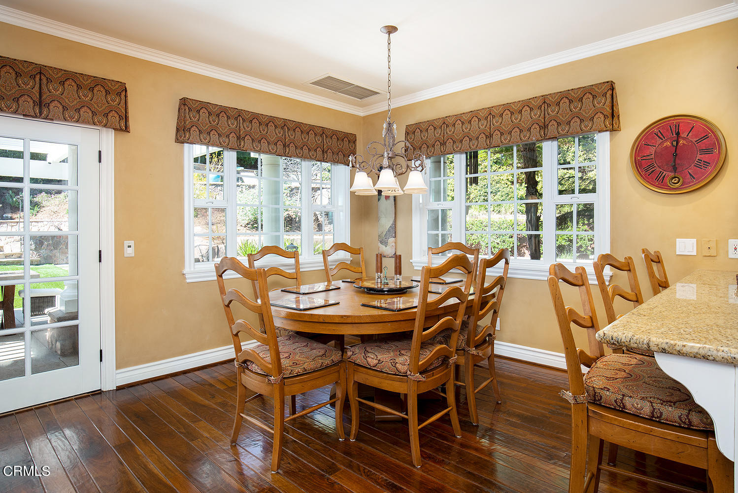 4535 Lone Pine Lane La Canada Flintridge, CA 91011 - Photo 20 of 62 a dining room with furniture a chandelier and wooden floor