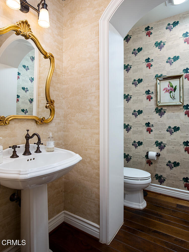 4535 Lone Pine Lane La Canada Flintridge, CA 91011 - Photo 25 of 62 a bathroom with a sink a toilet and shower curtain