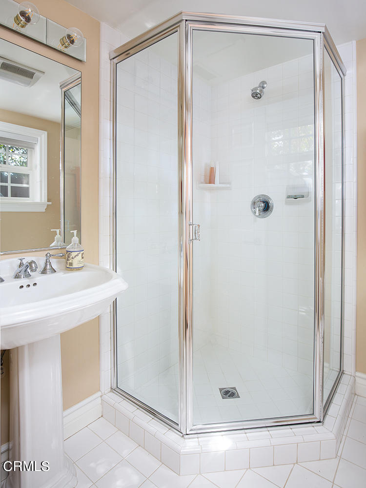 4535 Lone Pine Lane La Canada Flintridge, CA 91011 - Photo 27 of 62 a bathroom with a shower and a sink a mirror