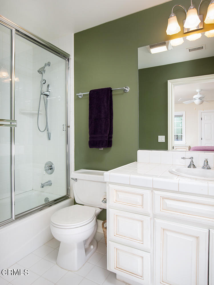 4535 Lone Pine Lane La Canada Flintridge, CA 91011 - Photo 37 of 62 a bathroom with a toilet sink vanity and shower
