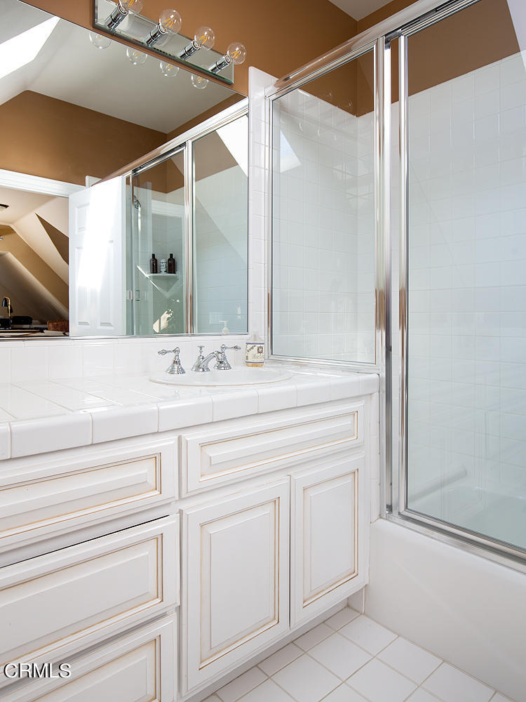 4535 Lone Pine Lane La Canada Flintridge, CA 91011 - Photo 43 of 62 a bathroom with a sink and a mirror