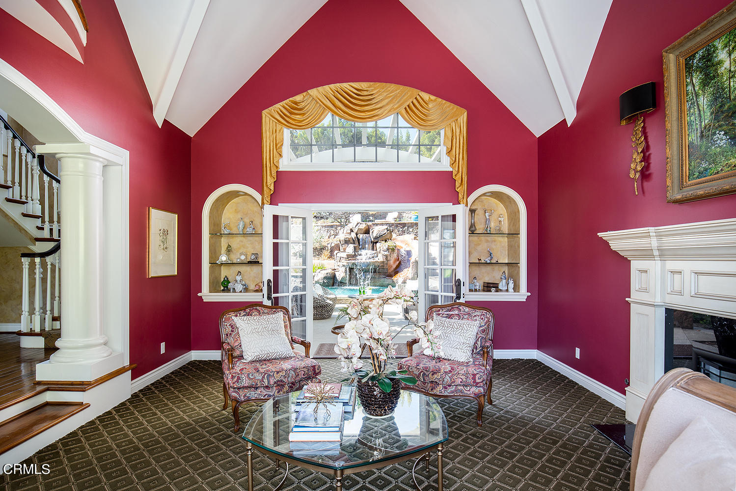 4535 Lone Pine Lane La Canada Flintridge, CA 91011 - Photo 10 of 62 a dining room with furniture a fireplace and large windows