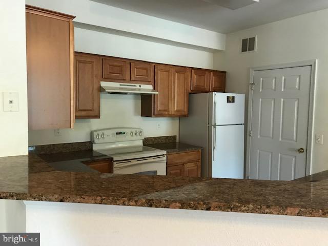 1530 Spring Gate Dr., Unit 9117 McLean, VA 22102 - Photo 8 of 15 Kitchen