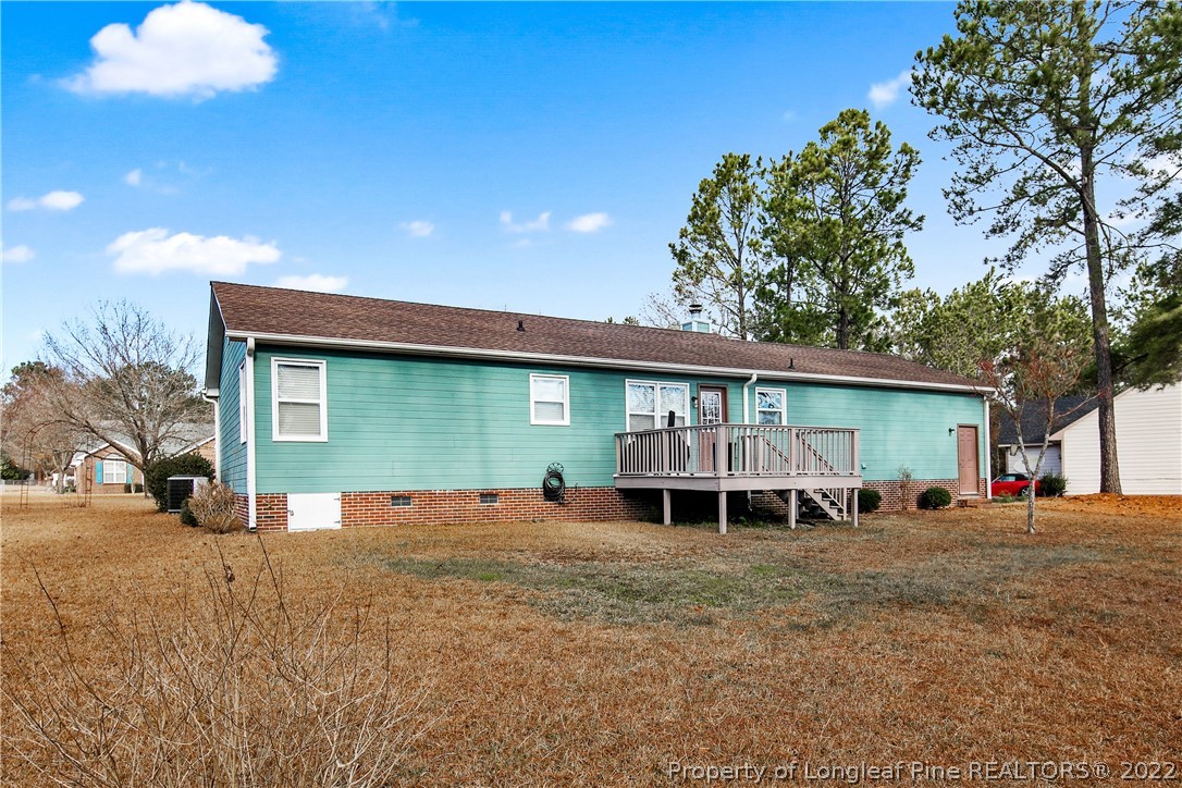 152 Overlook Road Cameron, NC 28326 - Photo 42 of 44 a view of a house with a yard and garage