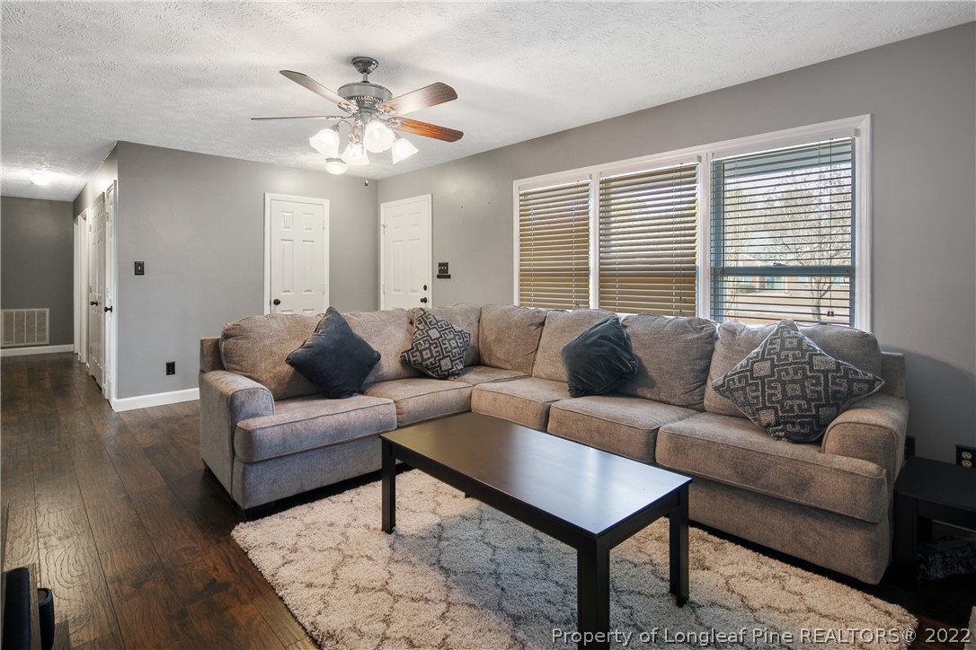 152 Overlook Road Cameron, NC 28326 - Photo 8 of 44 a living room with furniture and a large window