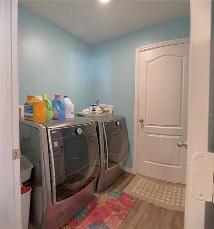 a utility room with dryer and washer