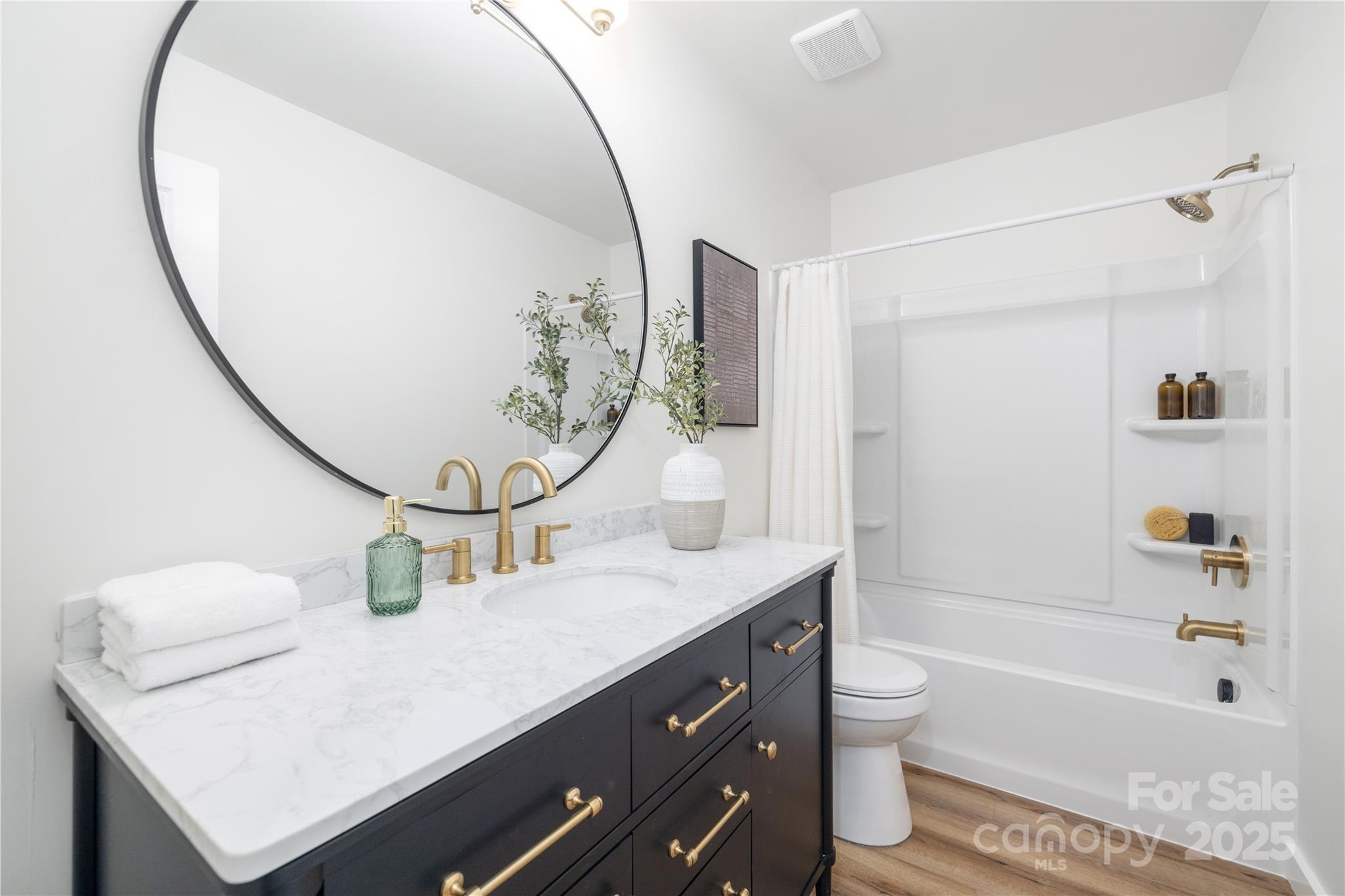 3100 Hickory Grove Drive Monroe, NC 28110 - Photo 13 of 16 a bathroom with a sink a toilet and shower