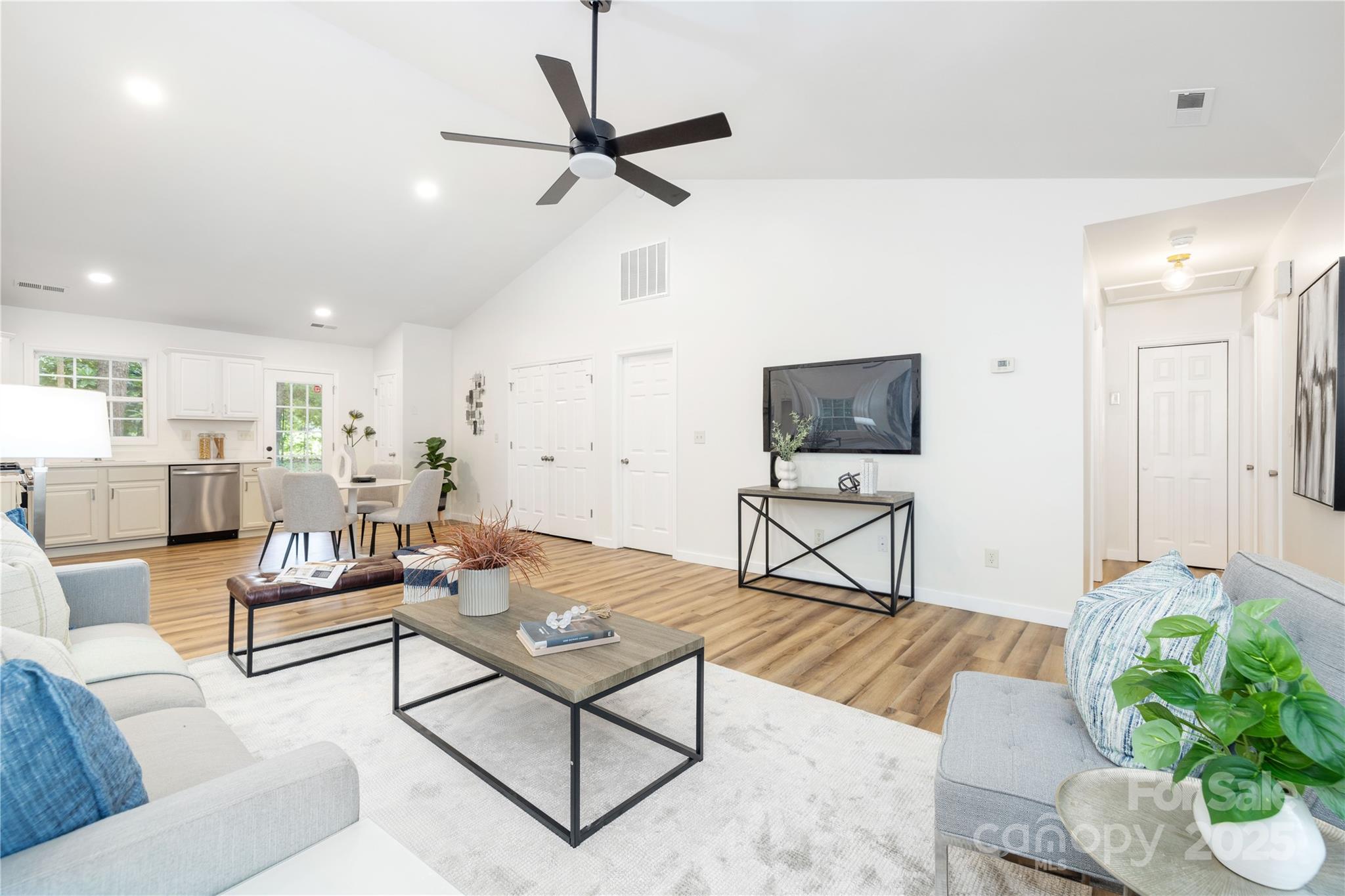 3100 Hickory Grove Drive Monroe, NC 28110 - Photo 14 of 16 a living room with furniture and a flat screen tv