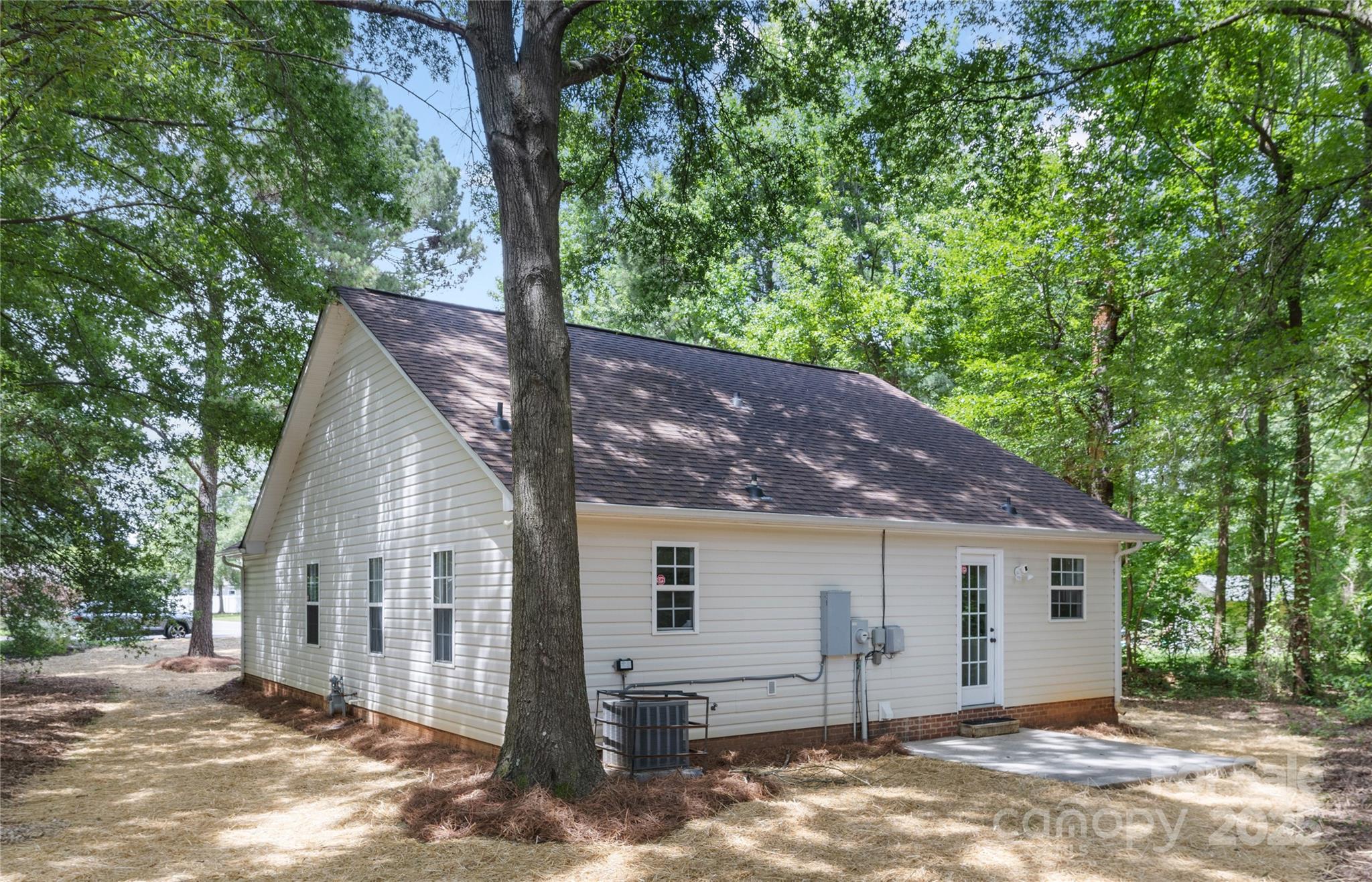 3100 Hickory Grove Drive Monroe, NC 28110 - Photo 15 of 16 a view of a house with a backyard