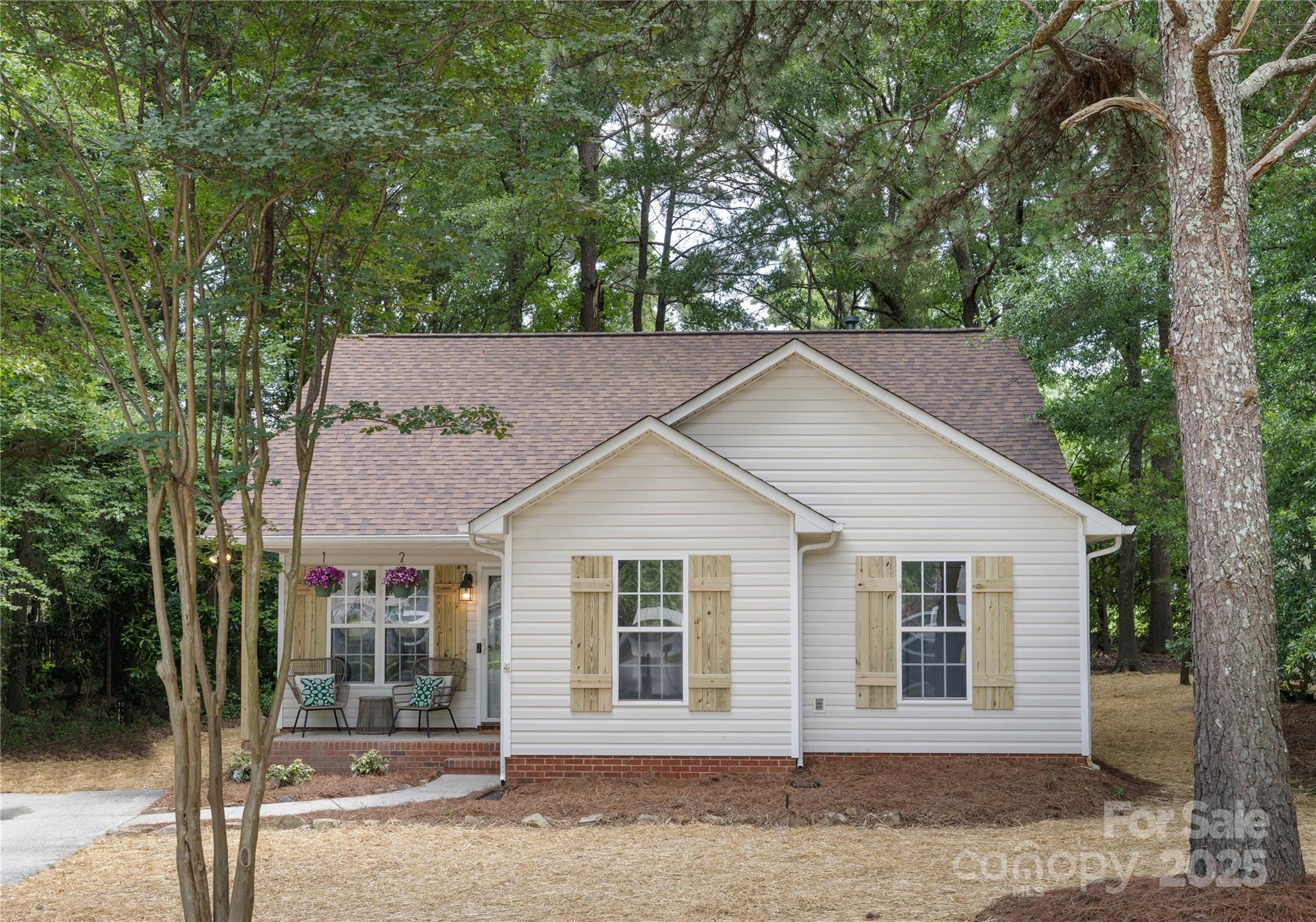3100 Hickory Grove Drive Monroe, NC 28110 - Photo 2 of 16 a house with trees in the background