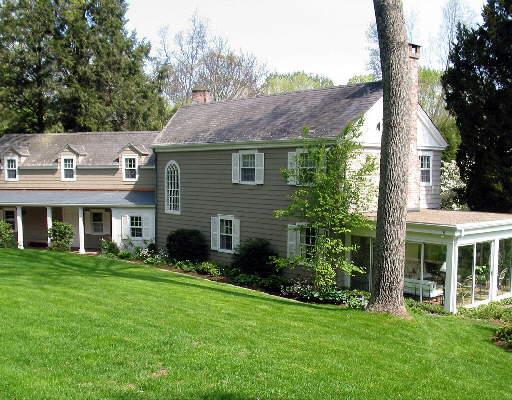 36 Cavalry Road Westport, CT 06880 - Photo 1 of 1 a front view of a house with a yard