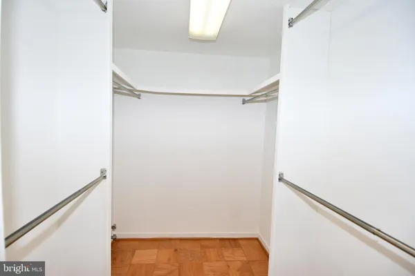 a view of an empty walk in closet