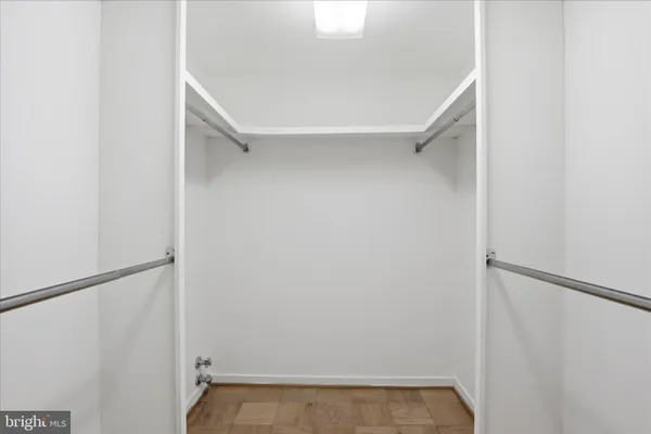 an empty room with a windows