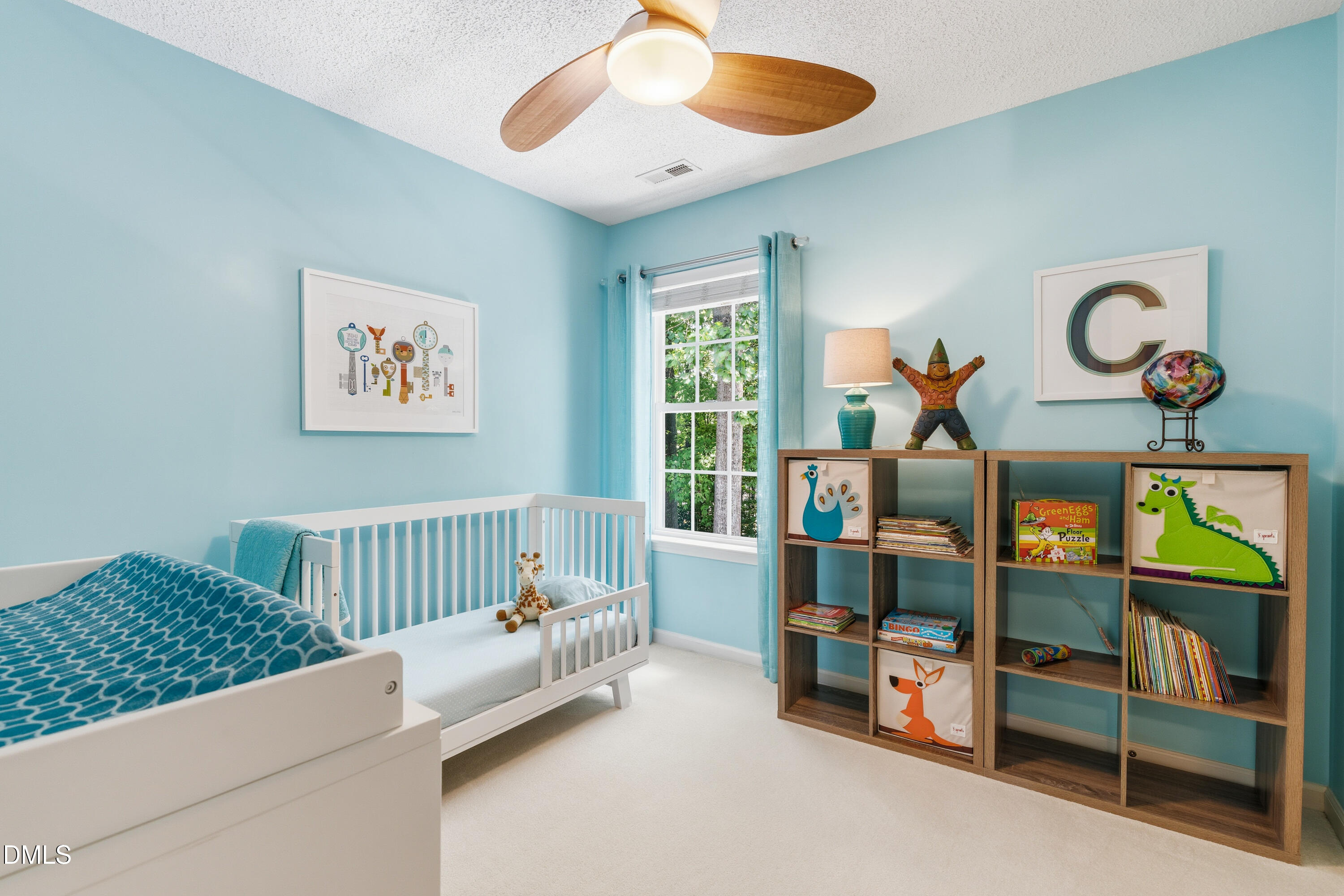 1211 Waterford Green Drive Apex, NC 27502 - Photo 39 of 53 a bedroom with furniture and a window