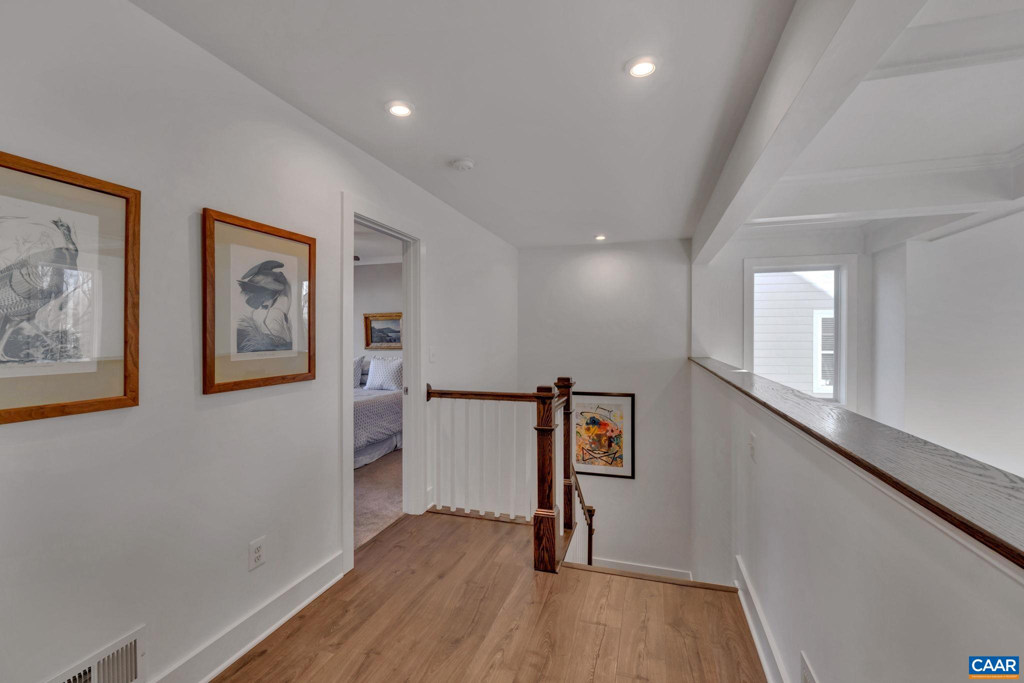 113 Paynes Mill Road Charlottesville, VA 22902 - Photo 36 of 75 a view of a hallway with wooden floor