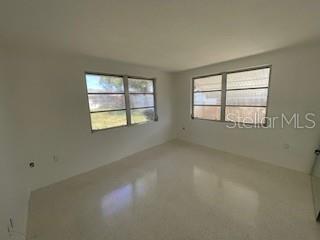 7533 Marechal Avenue Port Richey, FL 34668 - Photo 9 of 10 an empty room with a window
