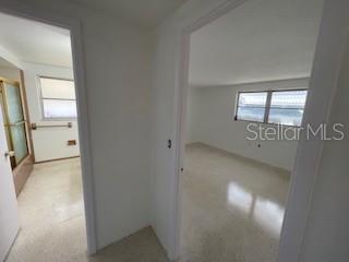 7533 Marechal Avenue Port Richey, FL 34668 - Photo 10 of 10 an empty room with windows