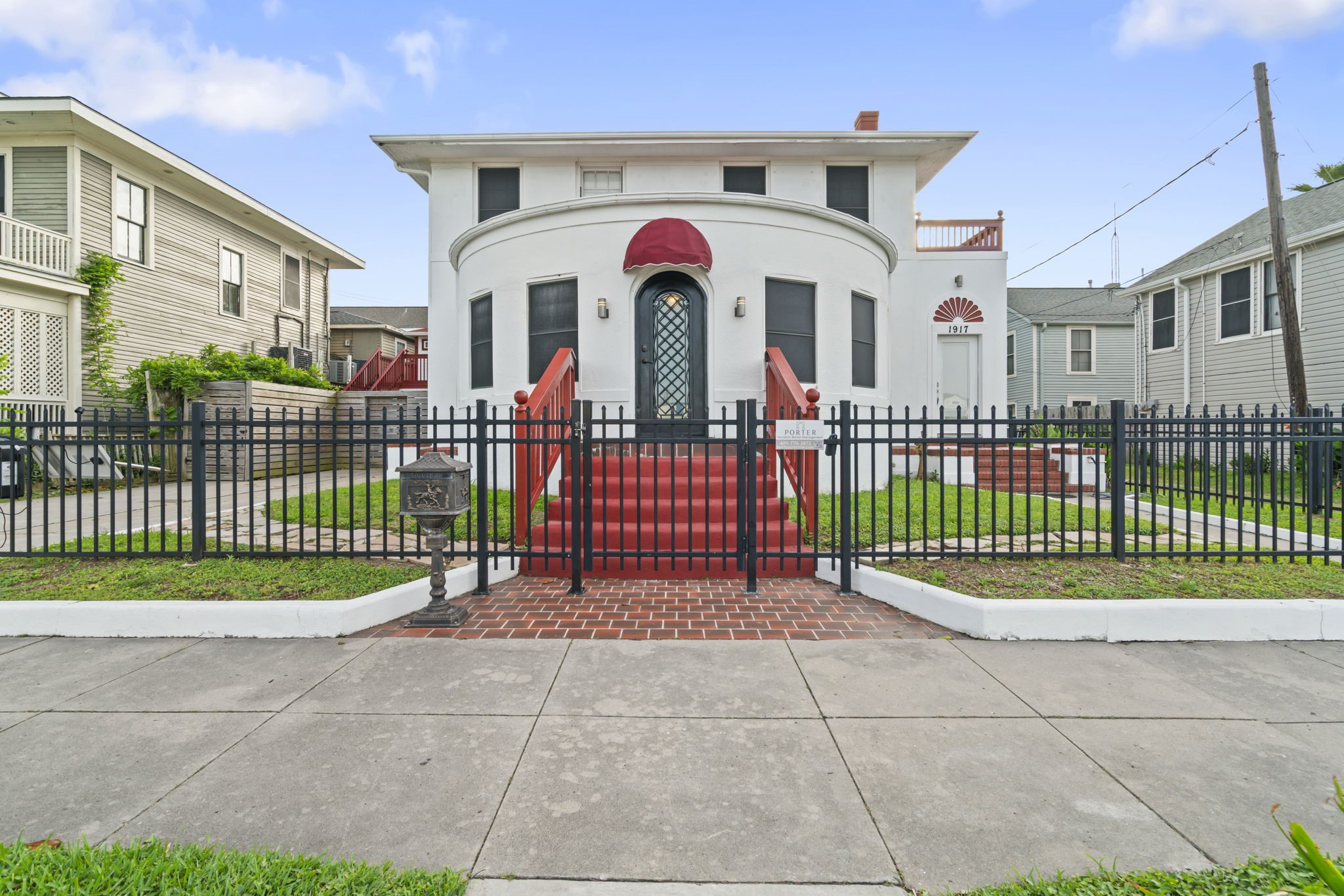 1919 Rosenberg Street Galveston, TX 77550 - Photo 23 of 25 a view of a wrought iron fences in front of house