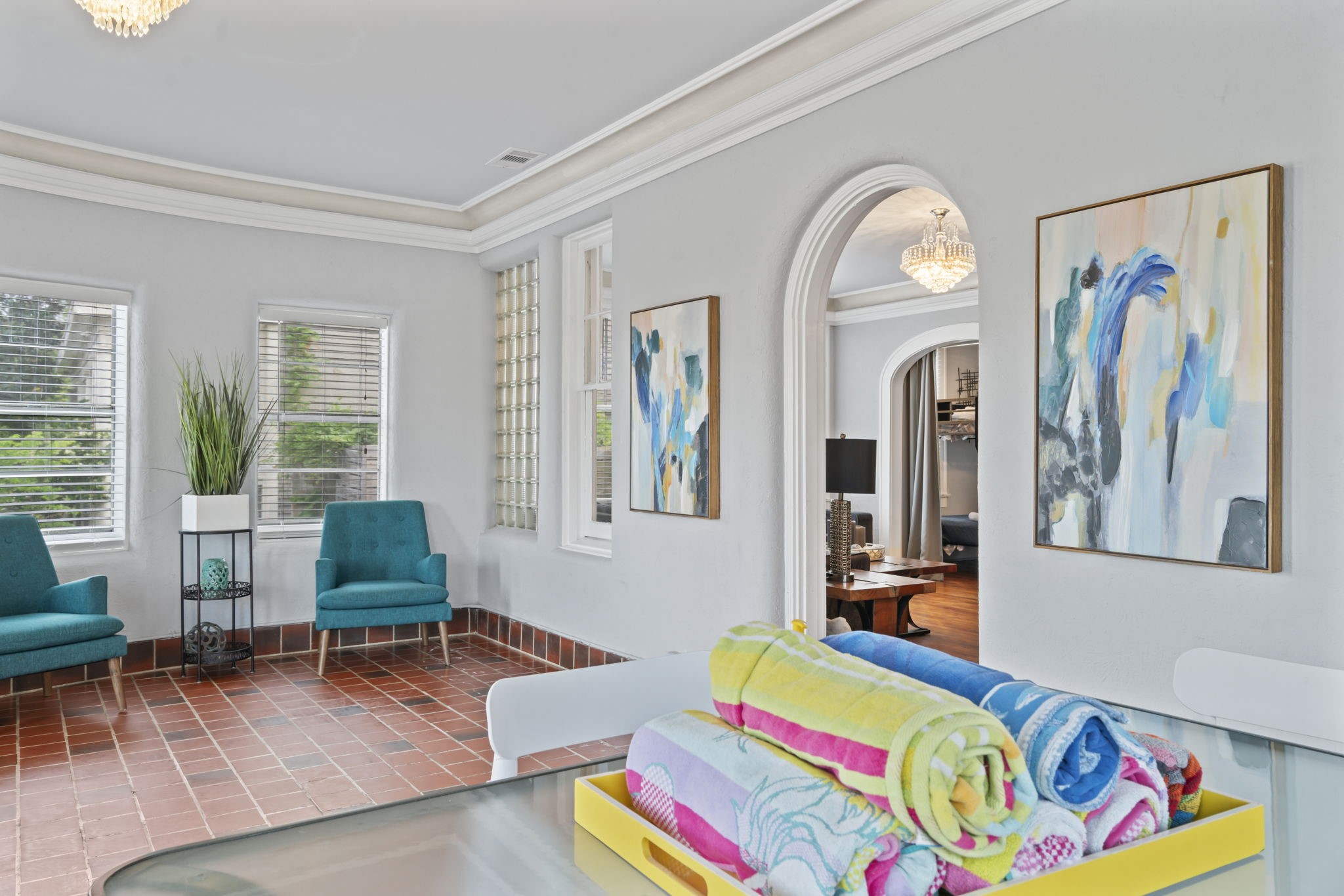 1919 Rosenberg Street Galveston, TX 77550 - Photo 5 of 25 a living room with furniture and a baby crib