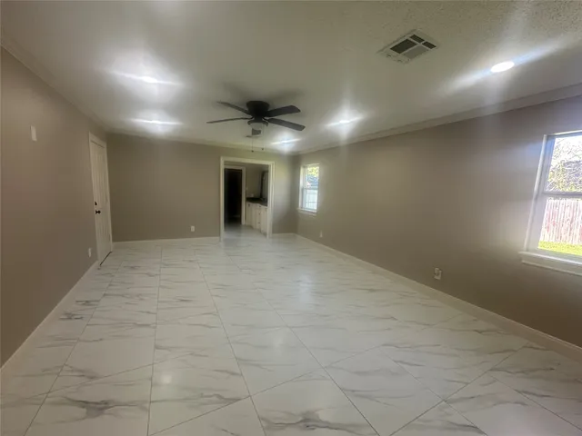 a bathroom with a mirror and a shower
