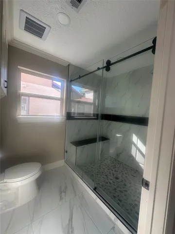 a bathroom with a sink and toilet