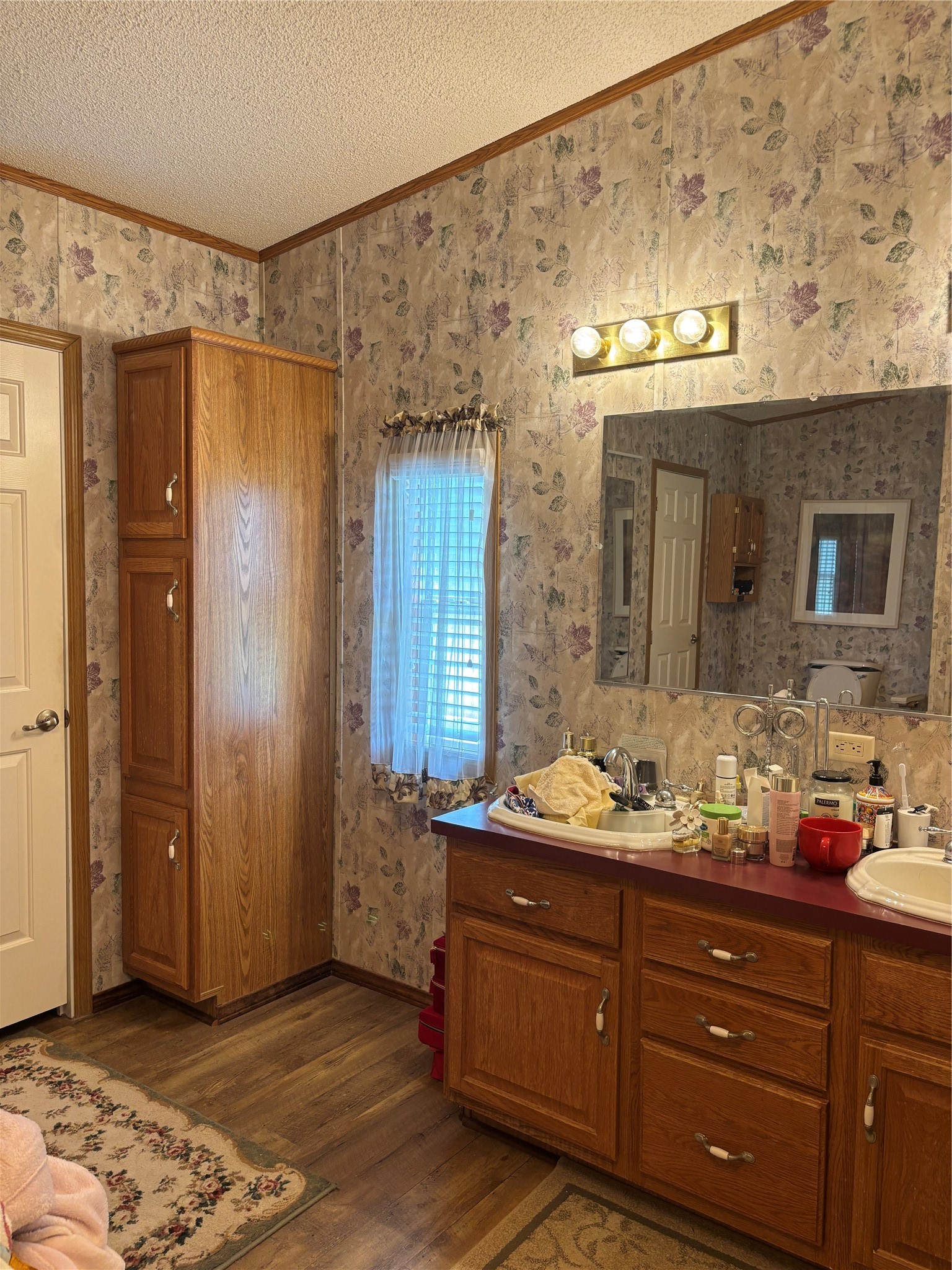 35599 State Highway South Buna, TX 77612 - Photo 31 of 40 a bathroom with a sink and a mirror