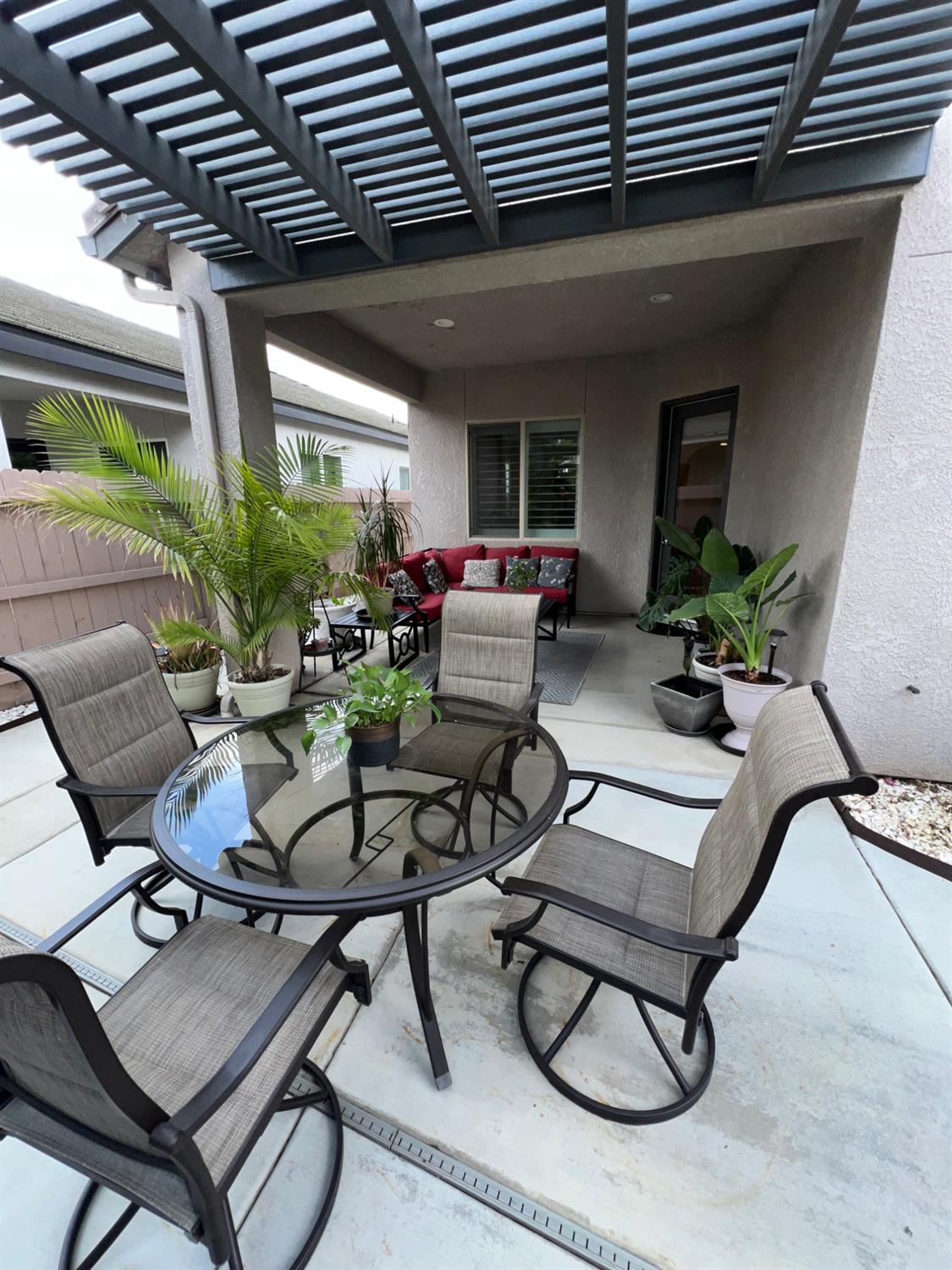 889 Coloma Place Madera, CA 93637 - Photo 53 of 61 a building outdoor space with patio furniture