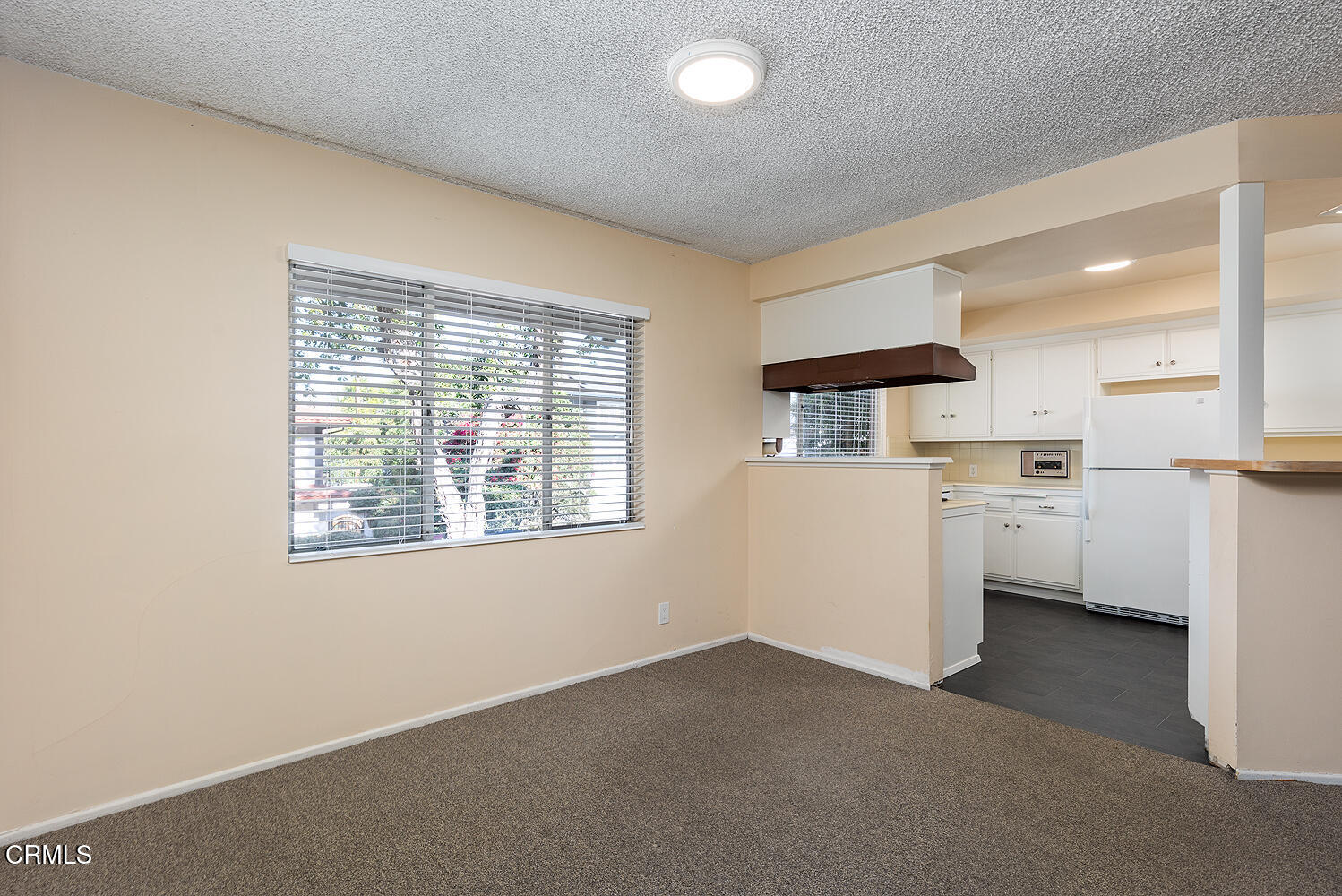 501 Martos Drive South Pasadena, CA 91030 - Photo 15 of 31 a view of a kitchen with white cabinets and wooden floor