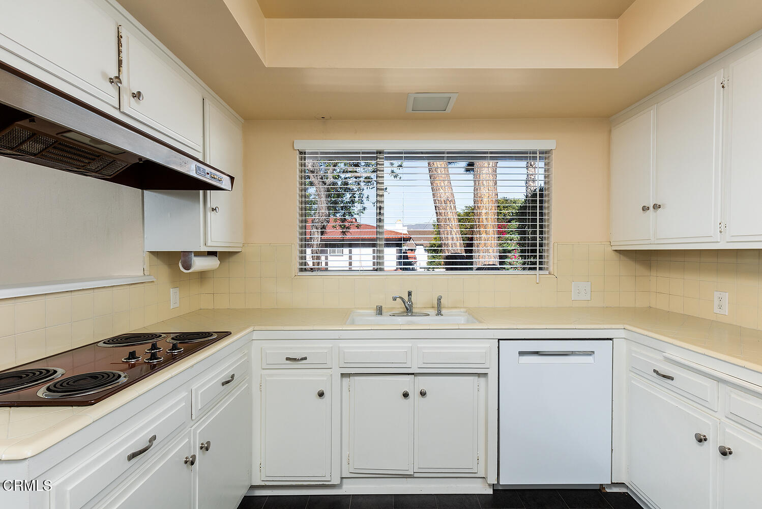 501 Martos Drive South Pasadena, CA 91030 - Photo 17 of 31 a kitchen with white cabinets and appliances