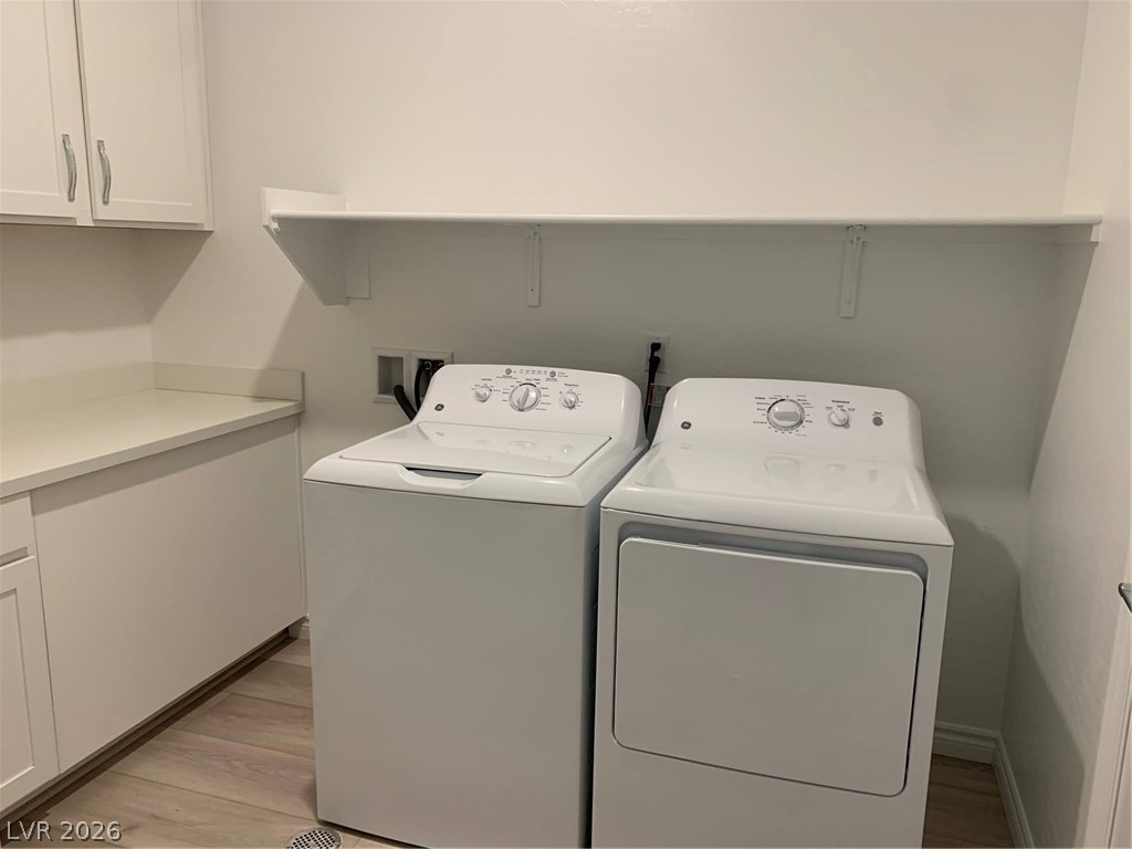 2555 Hampton Road, Unit 7109 Henderson, NV 89052 - Photo 29 of 34 Functional laundry room featuring a stacked washer and dryer unit for efficient space utilization.