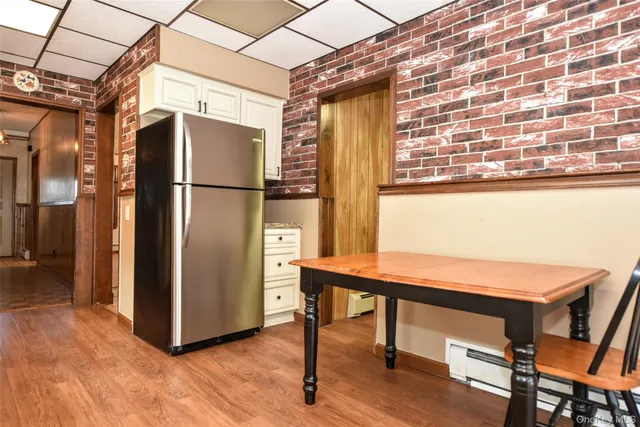 a room with a table and chairs