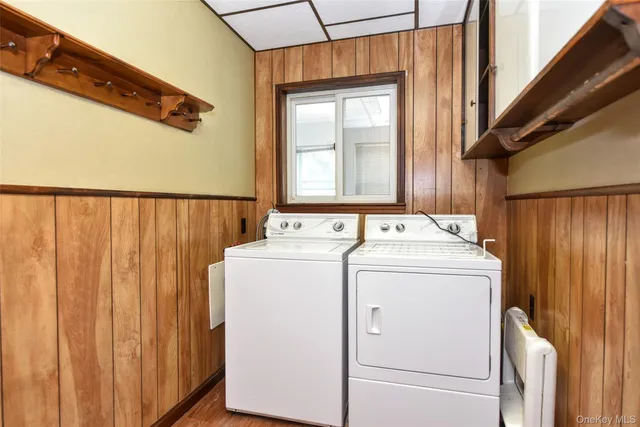 a utility room with dryer and washer