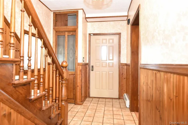 a view of an entryway with a floor