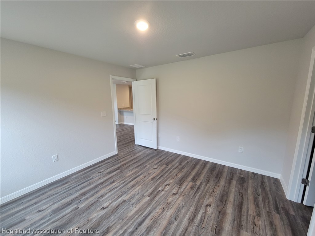 1389 Stone Circle Sebring, FL 33870 - Photo 8 of 39 wooden floor in a room