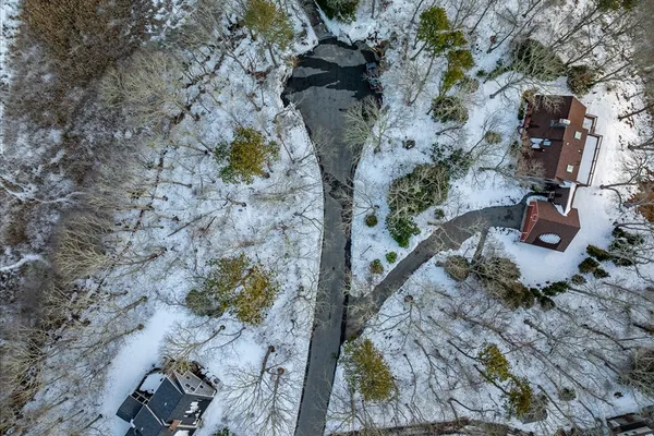 a view of a backyard of the house