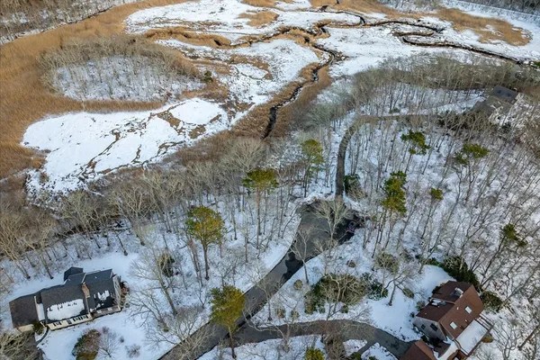 a view of a backyard of the house